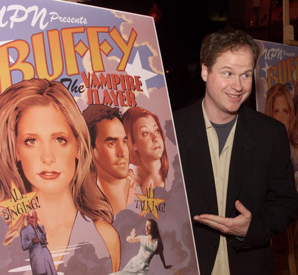 Joss Whedon with Buffy poster