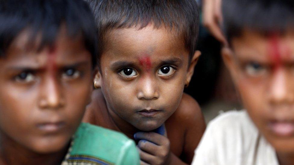 Hindu children gather at the temporary camp in Maungdaw township, Rakhine State, western Myanmar, 6 September 2017.