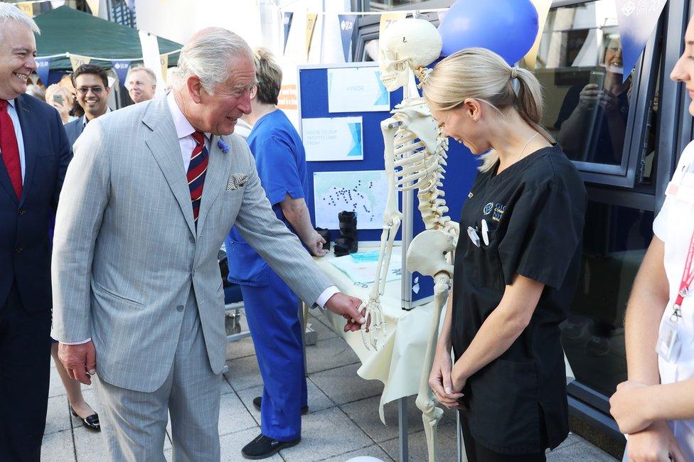 Prince Charles, Prince of Wales meets hospital staff as he visits Ysbyty Aneurin Bevan