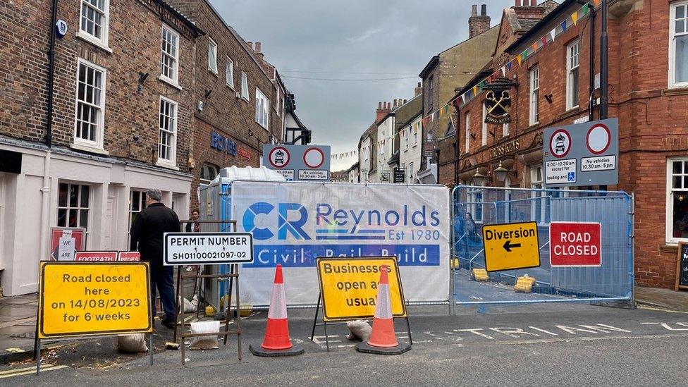 Signs and road closure at the top of Goodramgate