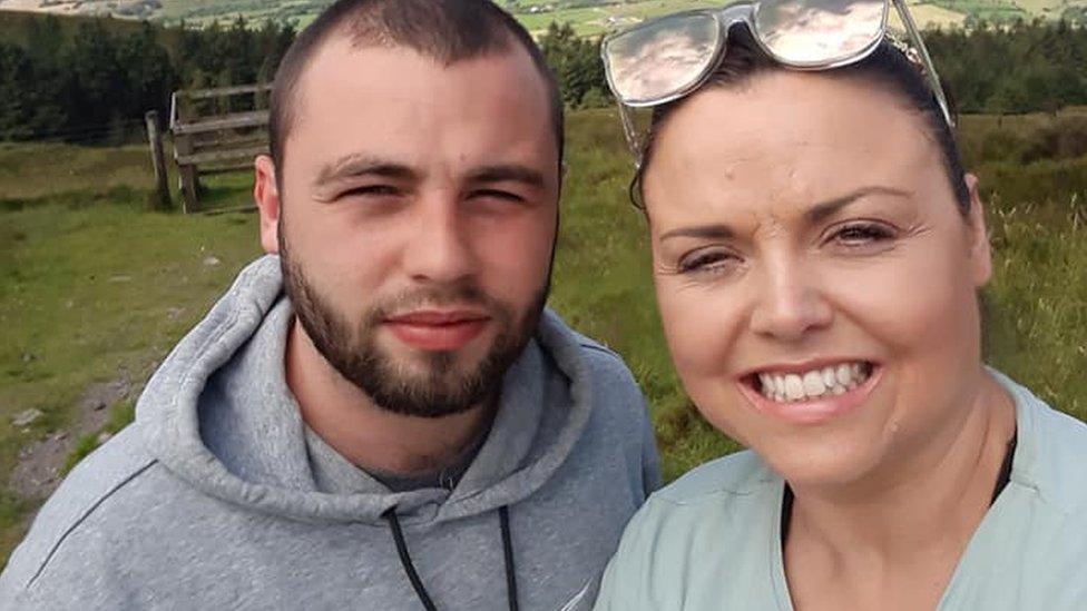 Seán Boyle with his mother Sinéad Boyle in countryside