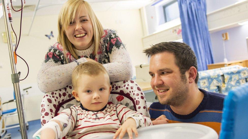 Zoe and Craig Alderson, with two-year-old Henry