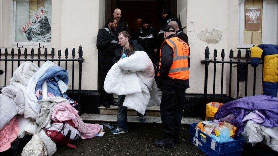 People leaving the £15 million Grade II listed mansion on Belgrave Plac