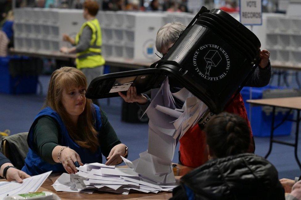 Election officials count votes for the Northern Ireland Assembly election in May 2022