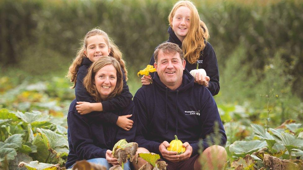 The Wilson family in a field in Northamptonshire