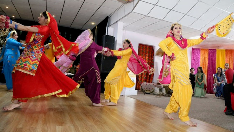 Indian women dancing