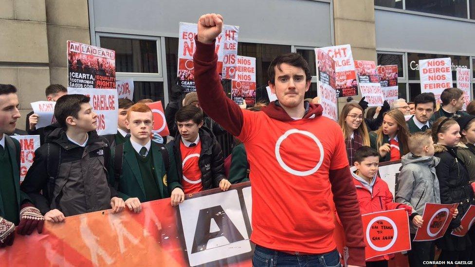 Irish language activists at a protest in Belfast against a decision to cut Irish language bursaries