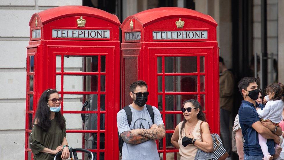 People outside with masks