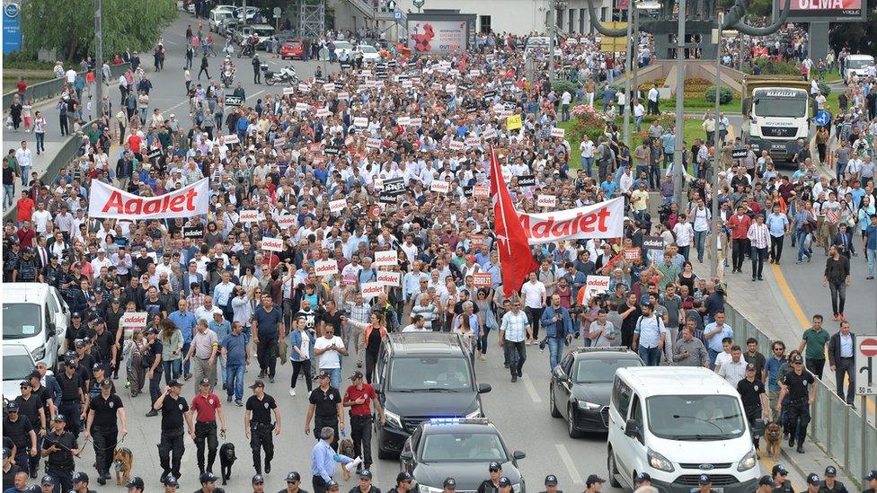 Demonstrators march during a protest against detention of main opposition Republican People's Party (CHP) lawmaker Enis Berberoglu, in Ankara, Turkey, June 15, 2017.