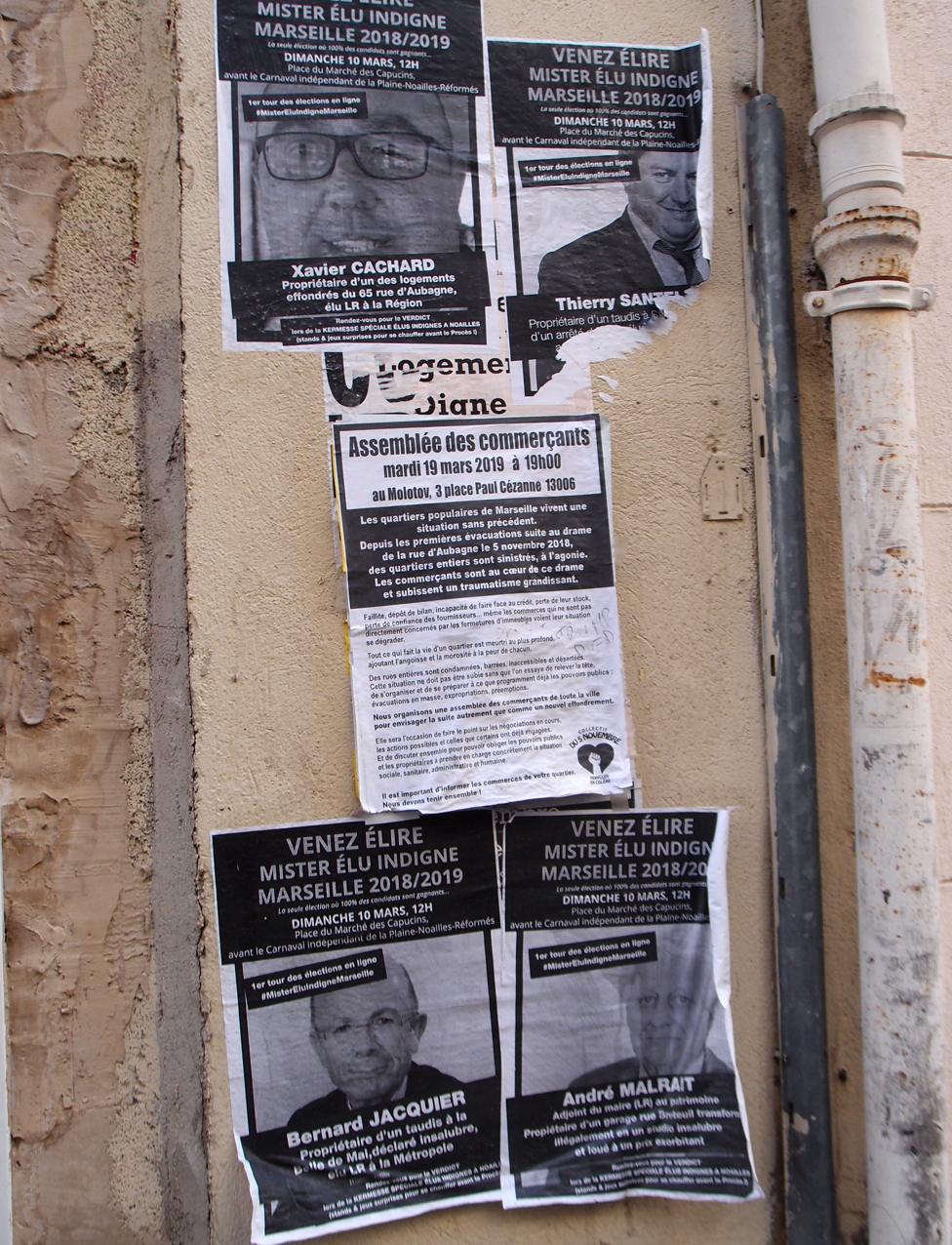 Posters calling sarcastically for people to vote for the four landlord politicians