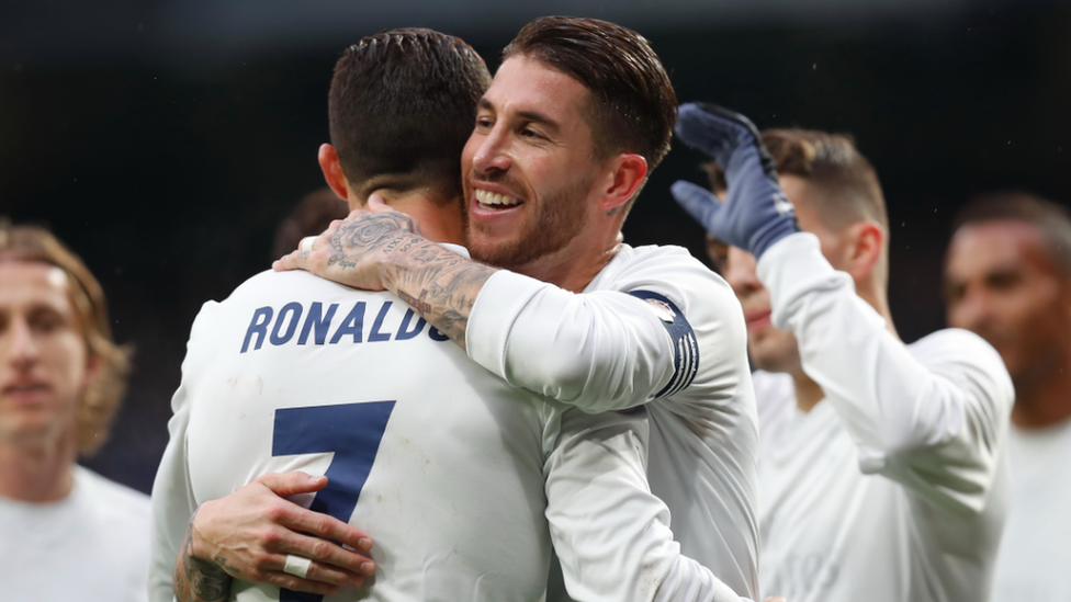 Sergio Ramos celebrates with Cristiano Ronaldo after scoring against Barcelona