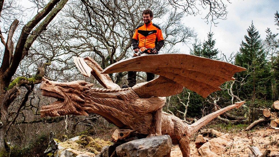 Simon O'Rourke carving the fallen tree