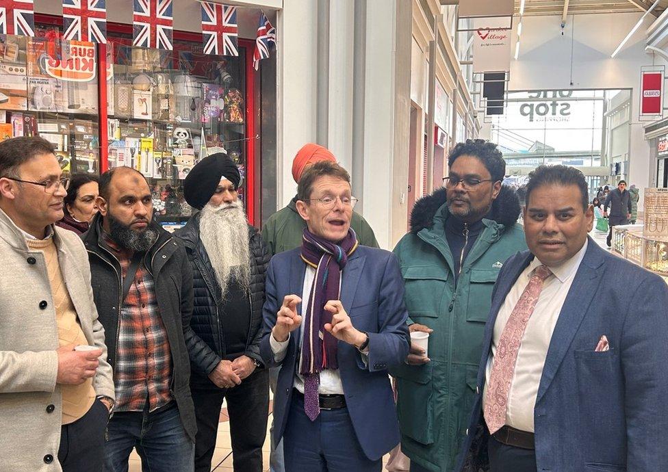 Andy Street, Desmond Jadoo and Khalid Mahmood with traders