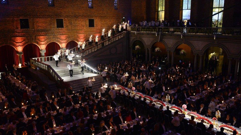 Guests attend the traditional Nobel Prize banquet at the Stockholm City Hall on December 10, 2014