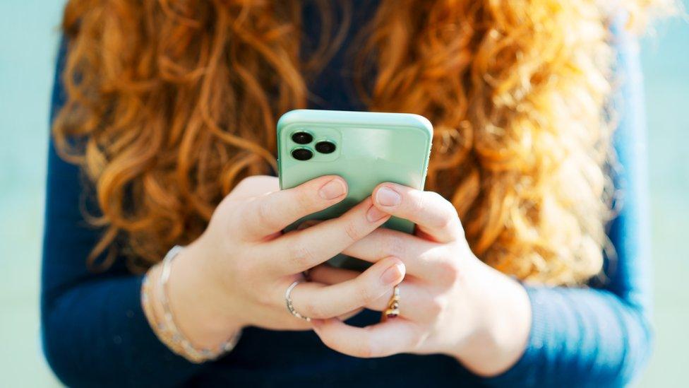 A woman on her phone