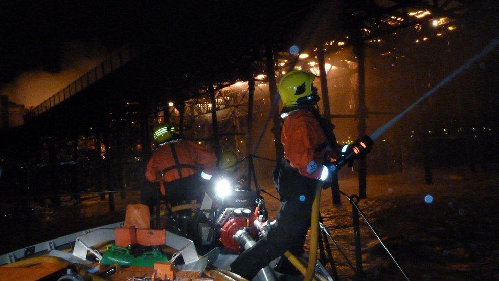 Crews fighting the pier fire