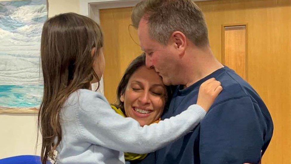 Nazanin Richard and Gabriella hugging at airport