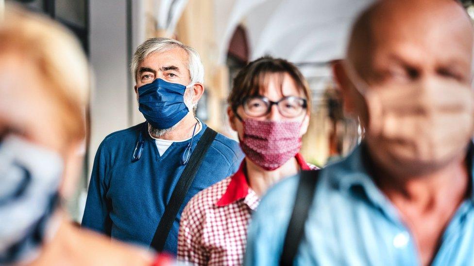 group of people with masks