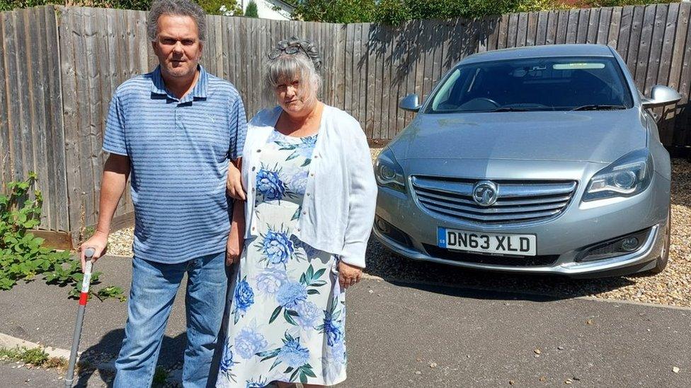 Tim Richardson, with his wife Janie, who broke his back after suffering a seizure while being driven to hospital