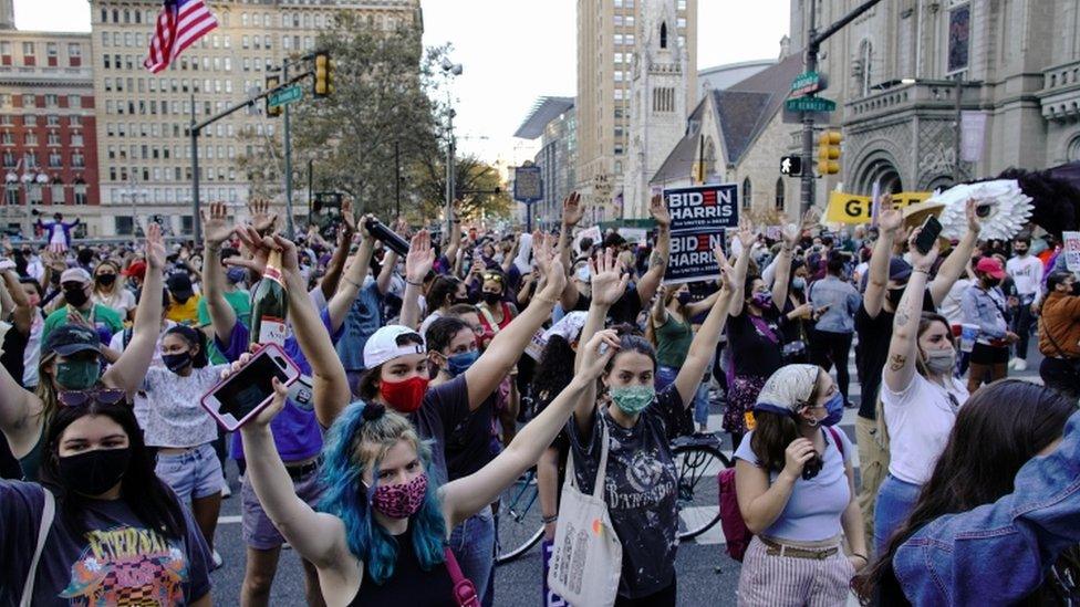 People gather as they celebrate in Philadelphia, Pennsylvania