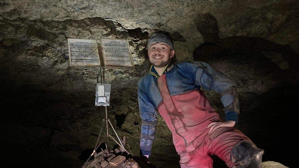 Thomas Phillips in a cave