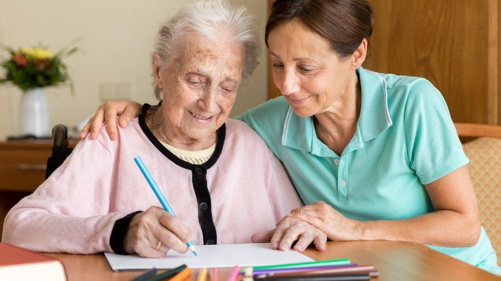 Caregiver with elderly woman