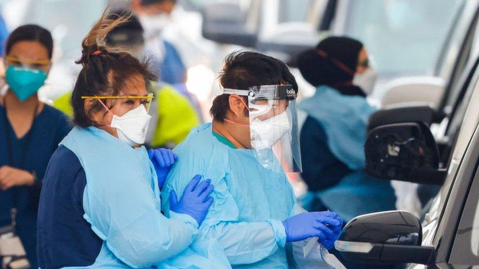 Health workers conduct COVID-19 tests at the Bondi Beach testing clinic on December 28, 2021 in Sydney, Australia