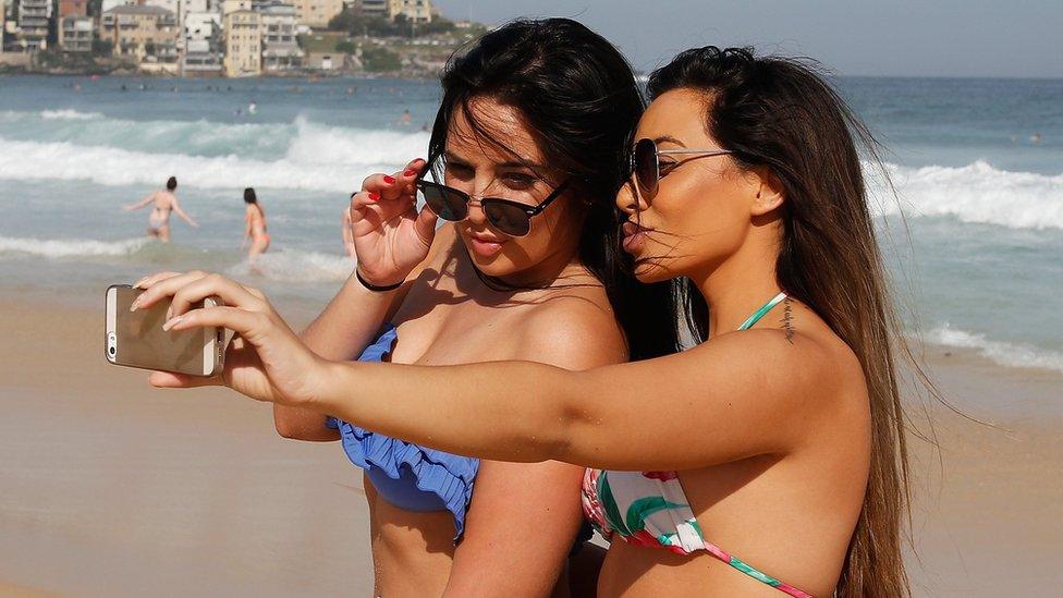 Women taking a selfie