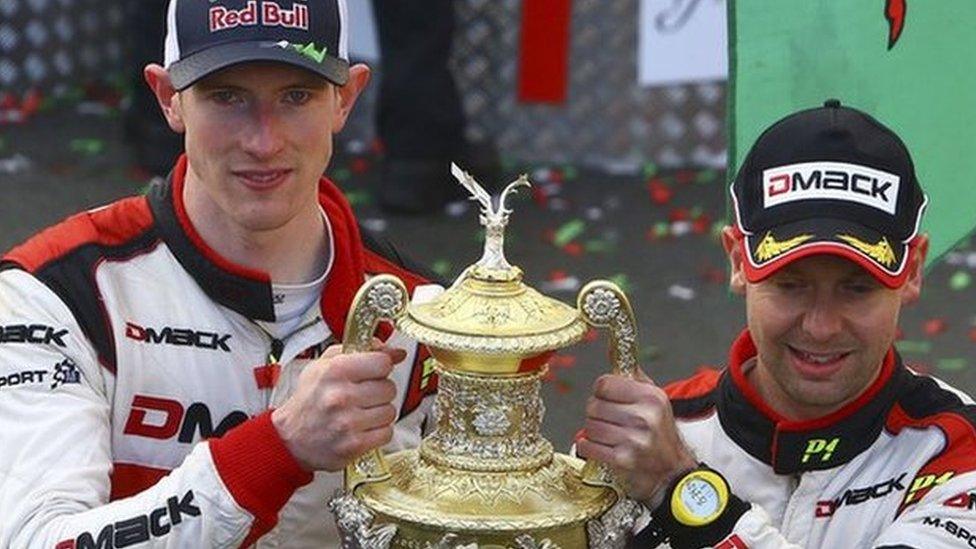 Elfyn Evans and Daniel Barritt with the trophy after winning the 2017 Wales Rally GB