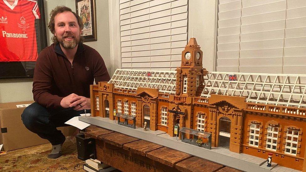 Tyler and his Lego replica of Nottingham railway station