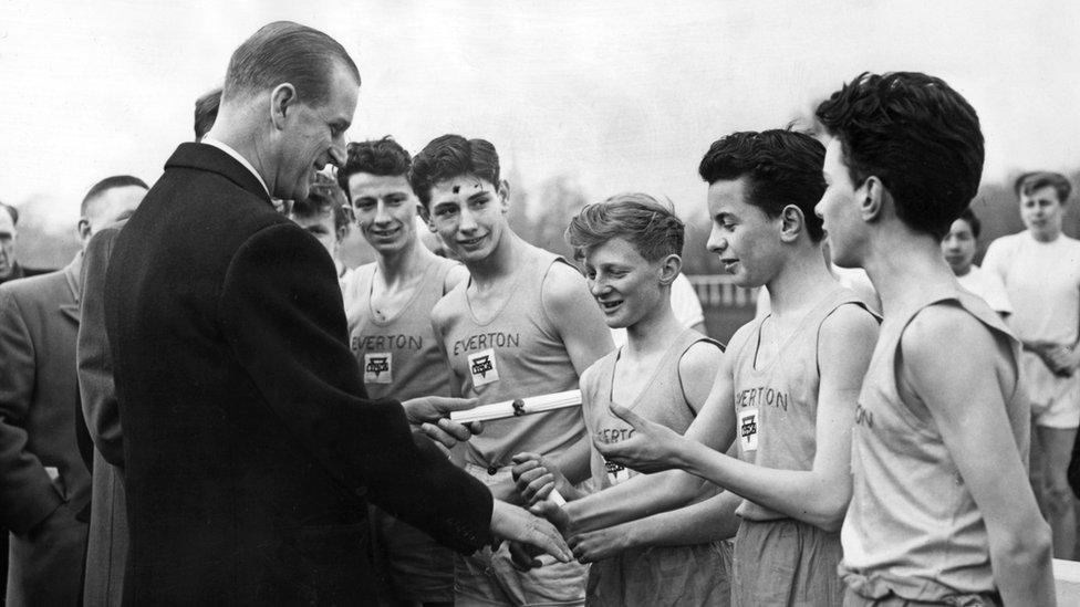 At the Liverpool Boys' Association grounds Prince Philip presents badges and certificates for the Duke of Edinburgh award in 1958