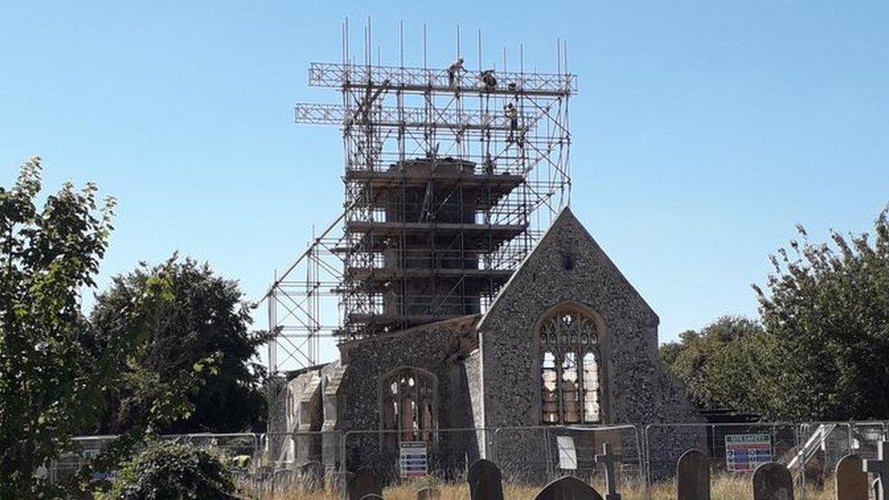 Scaffolding surrounding the church tower