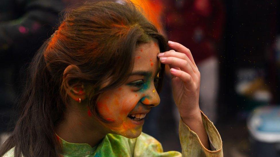 A girl at a Holi celebration