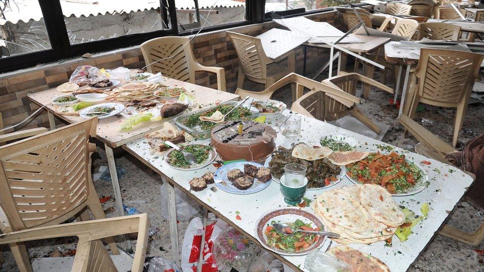 Aftermath of suicide bomb attack at a restaurant in Rabweh, Damascus (15 March 2017)