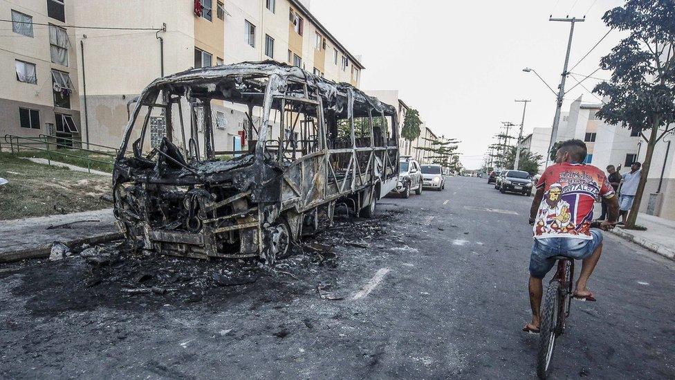 A burnt bus in the northern Brazilian city of Fortaleza