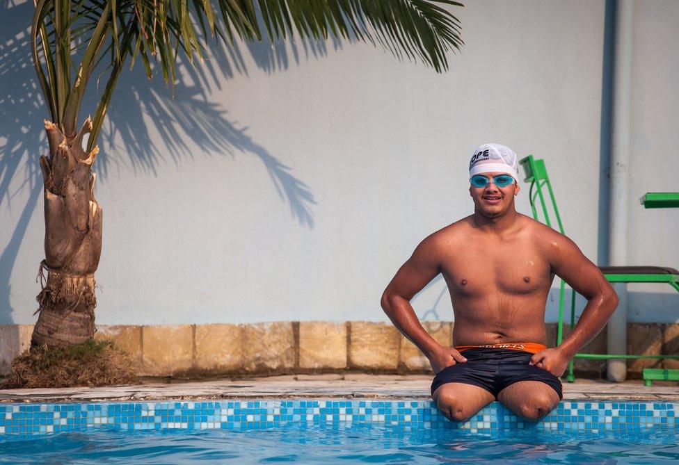 18 year old Ramesh by the poolside