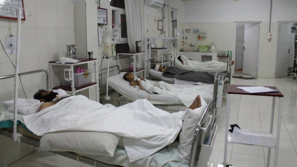 Casualties from car bombing lying in hospital