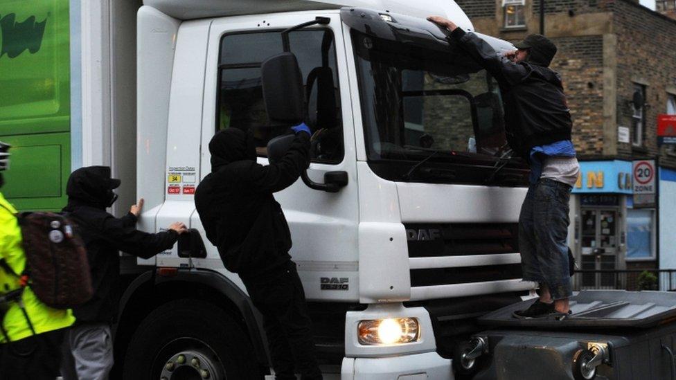 A lorry drove through a barricade in Kingsland Road with people clinging to it