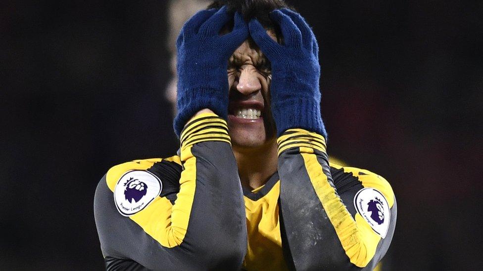 Alexis Sanchez pulls an annoyed face