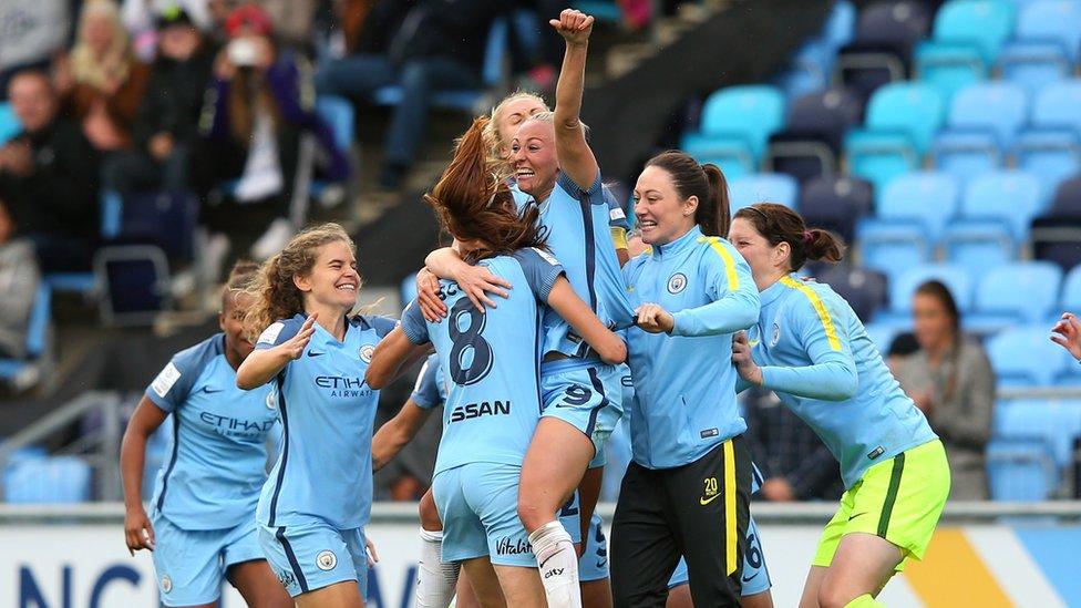 Manchester City players celebrating