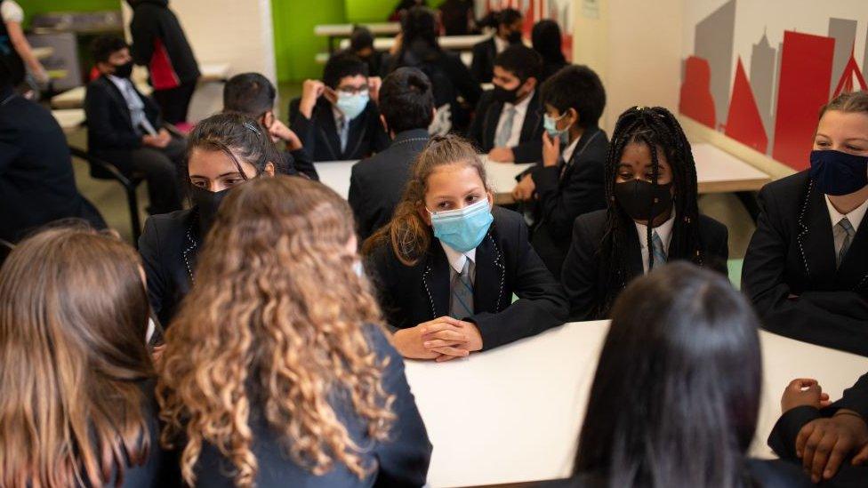 school children wearing masks