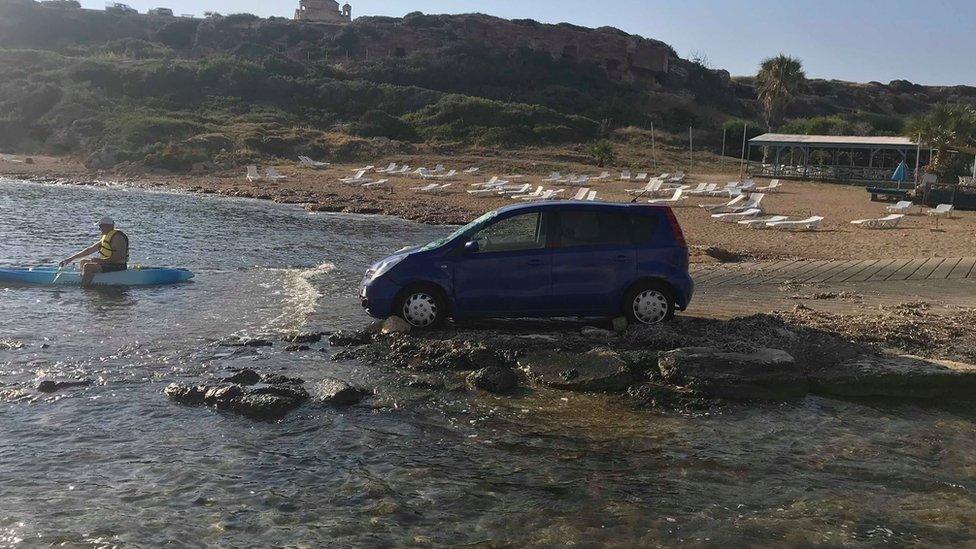 Car in river