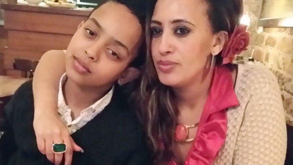 Berkti Haftom, 29 with her son Biruk Haftom, 12, who both died in the fire