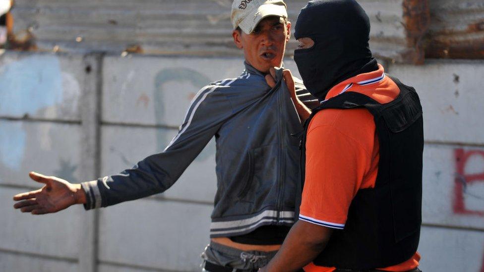 A general view of man arrested in Parkwood on Day Six of National Lockdown on April 01, 2020 in Cape Town, South Africa