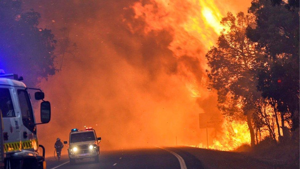 Fire fighters battling a fire near Yarloop in Western Australia