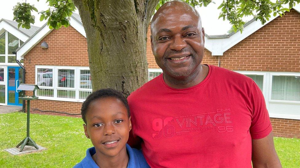 Nial with his dad Nkosi