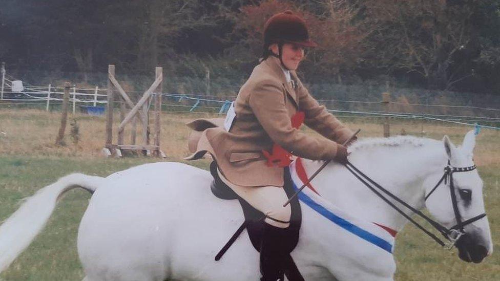 Louise Evans riding a horse