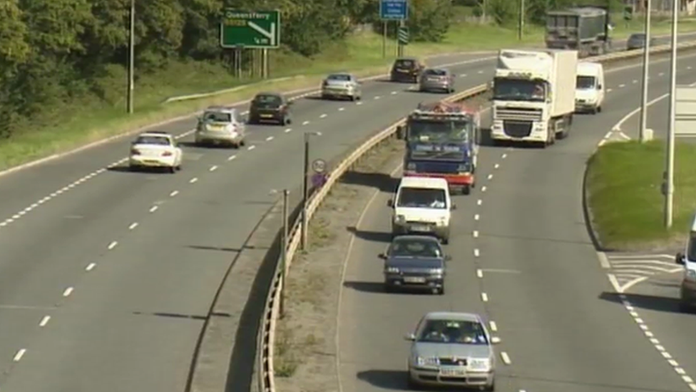 Cars travelling on road in north Wales