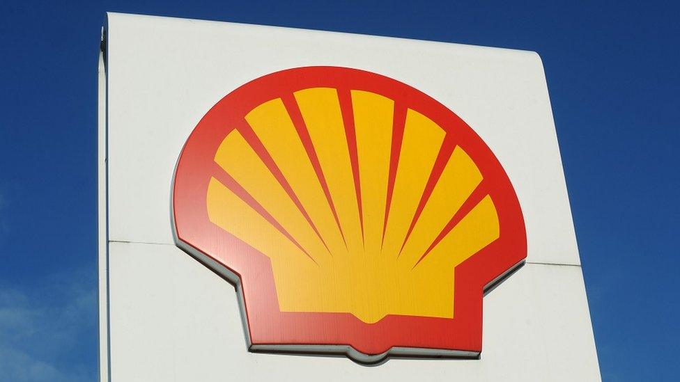 A stock photo shows a Shell logo at a petrol station