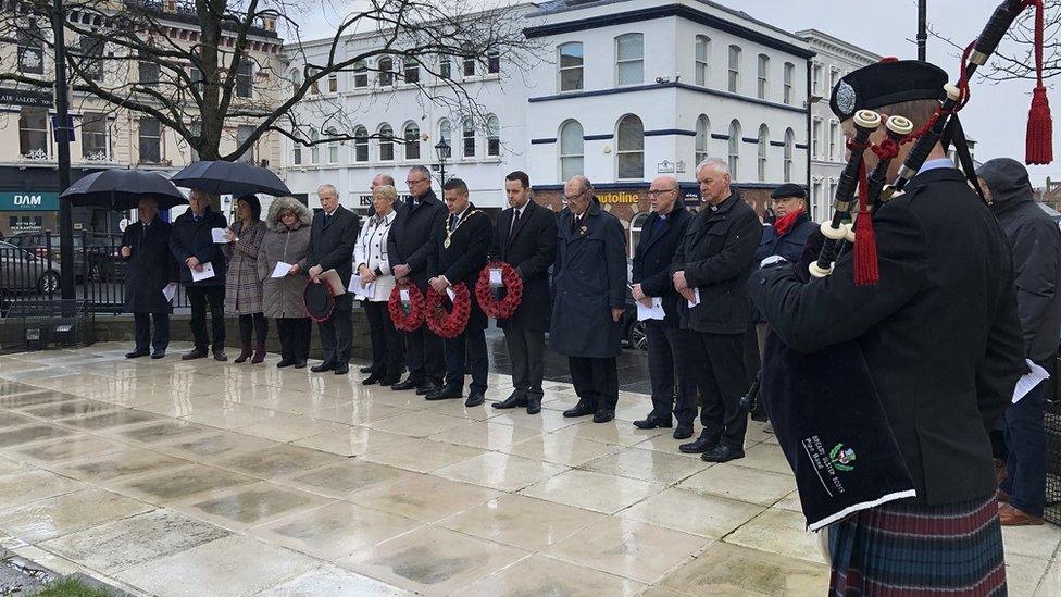 A minutes silence in memory of two murdered RUC officers is held in Londonderry